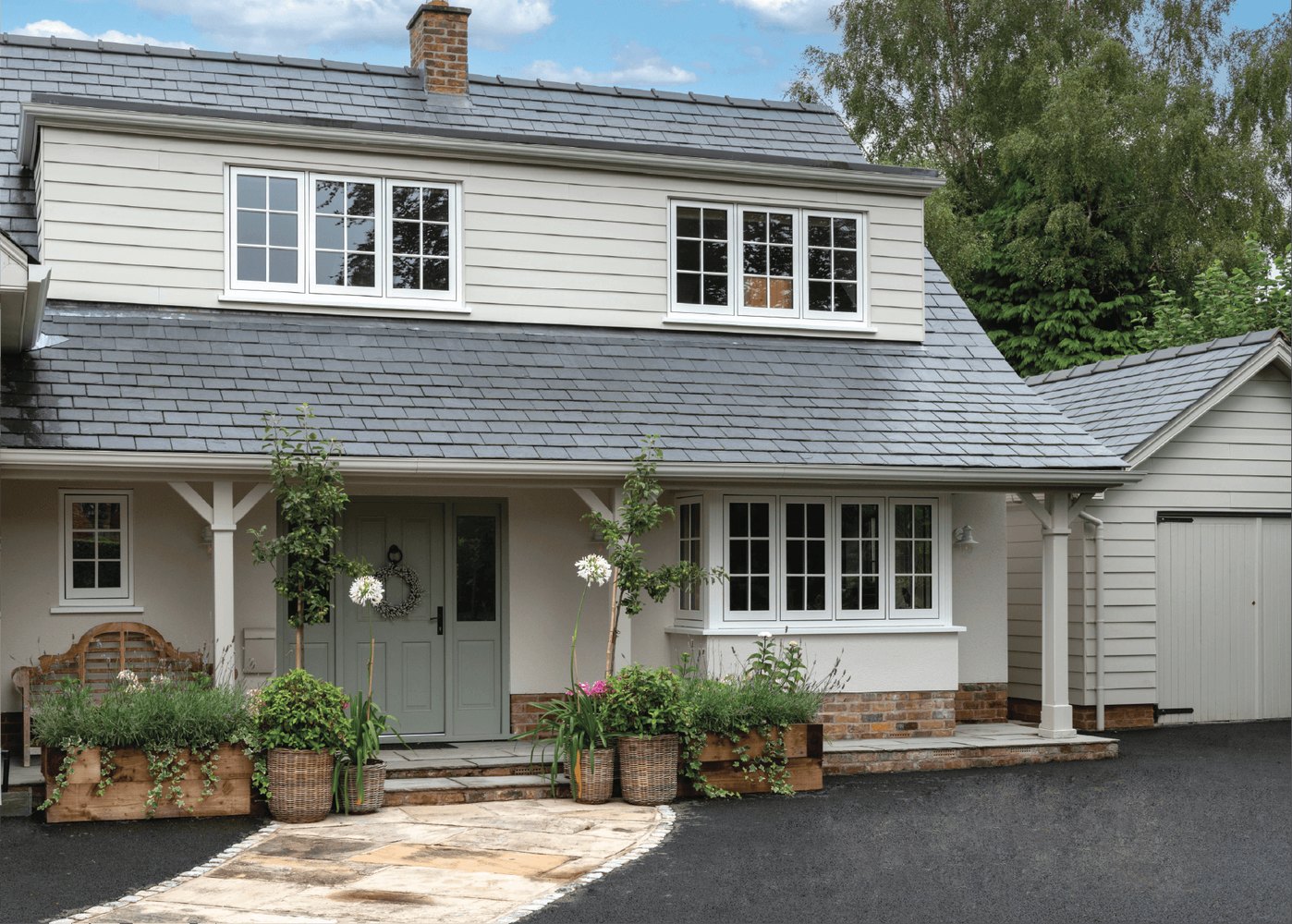 Timberlook Heritage Flush Sash windows on a cream character home