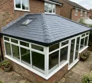 Solid tiled conservatory roof on a UK home