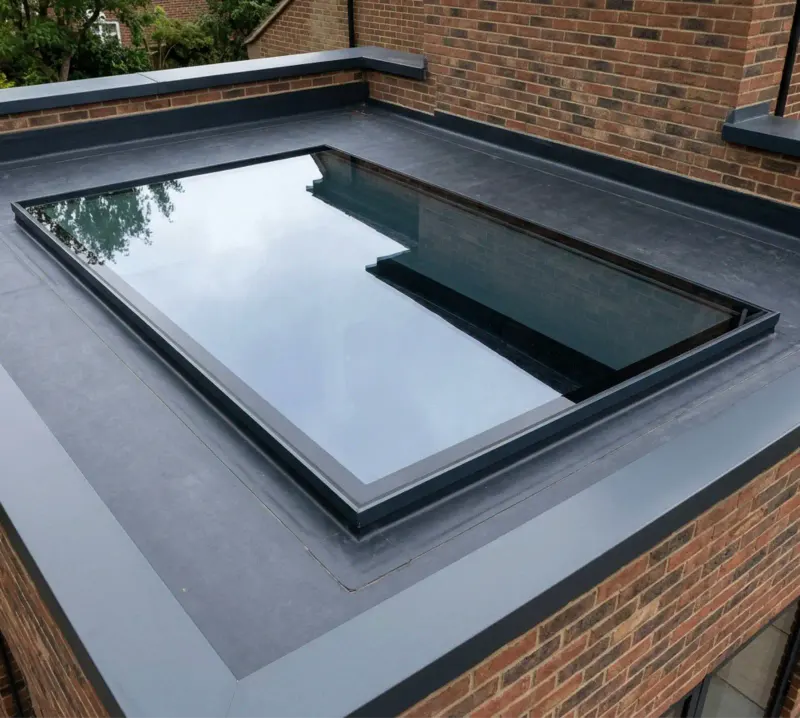 Flat rooflight installed on a flat roof extension