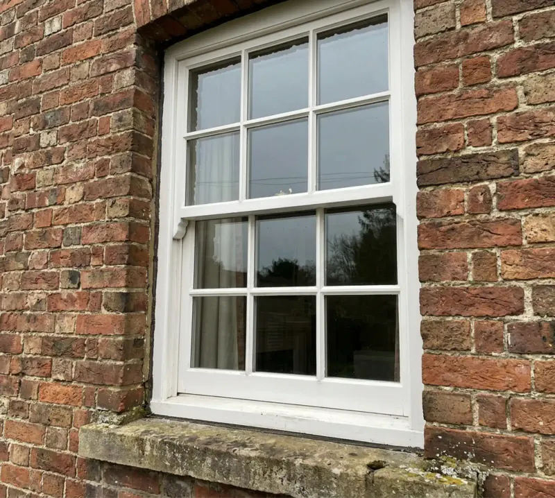 Traditional sash-style windows on a period property