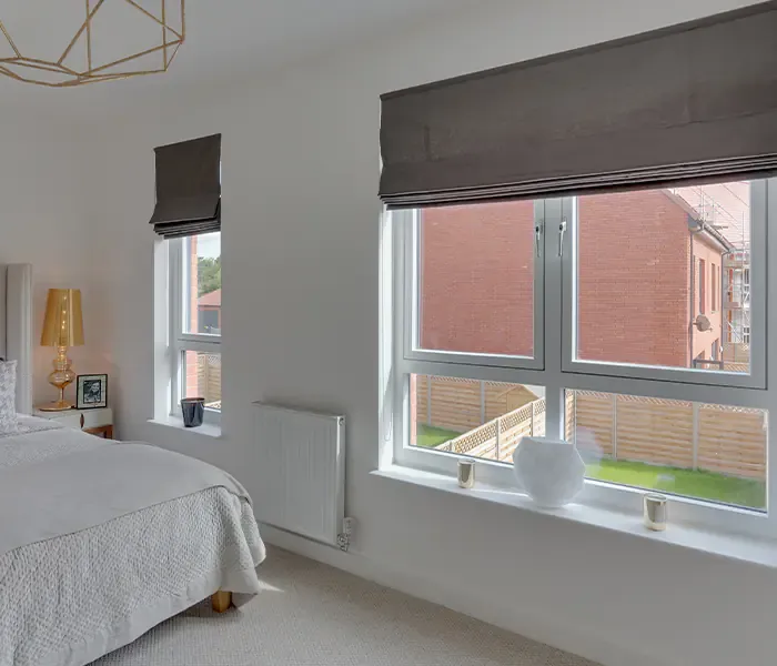 White Eurocell Modus windows viewed from inside a bright bedroom