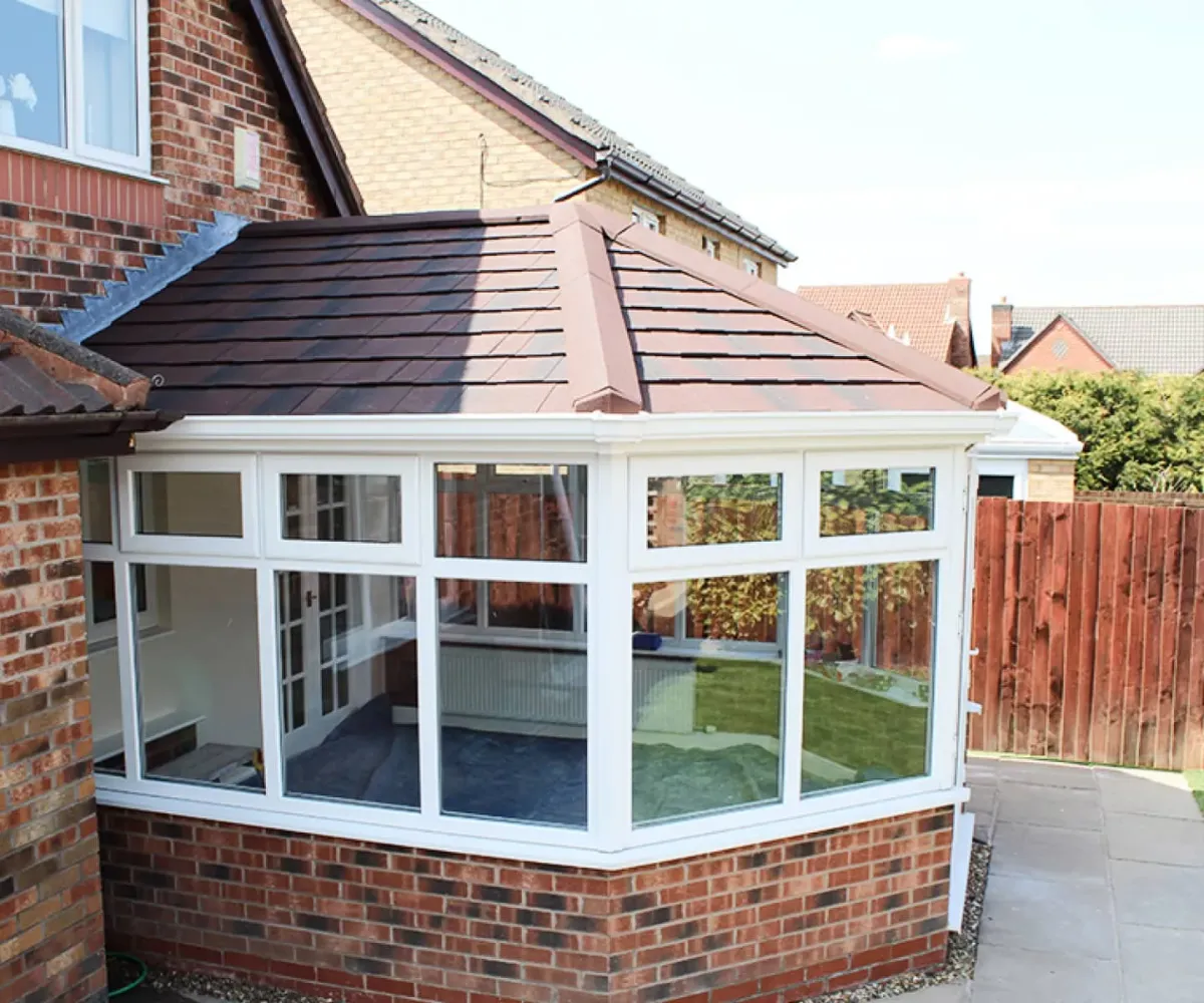 Solid conservatory roof tiles