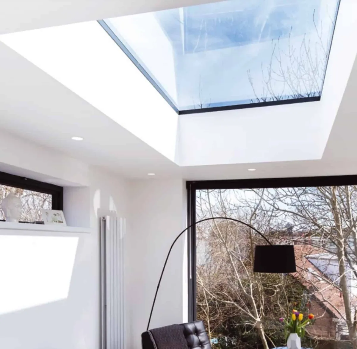 Flat rooflight set into a roof deck